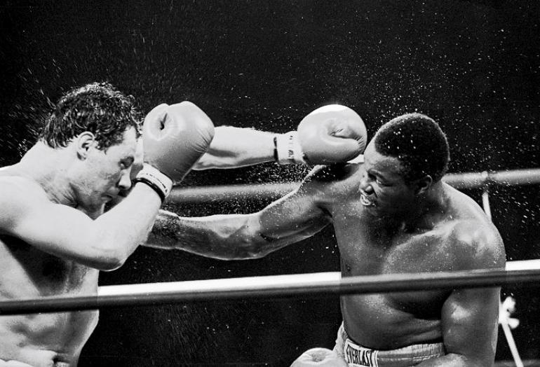 Larry Holmes - Lucien Rodriguez 1983.jpg